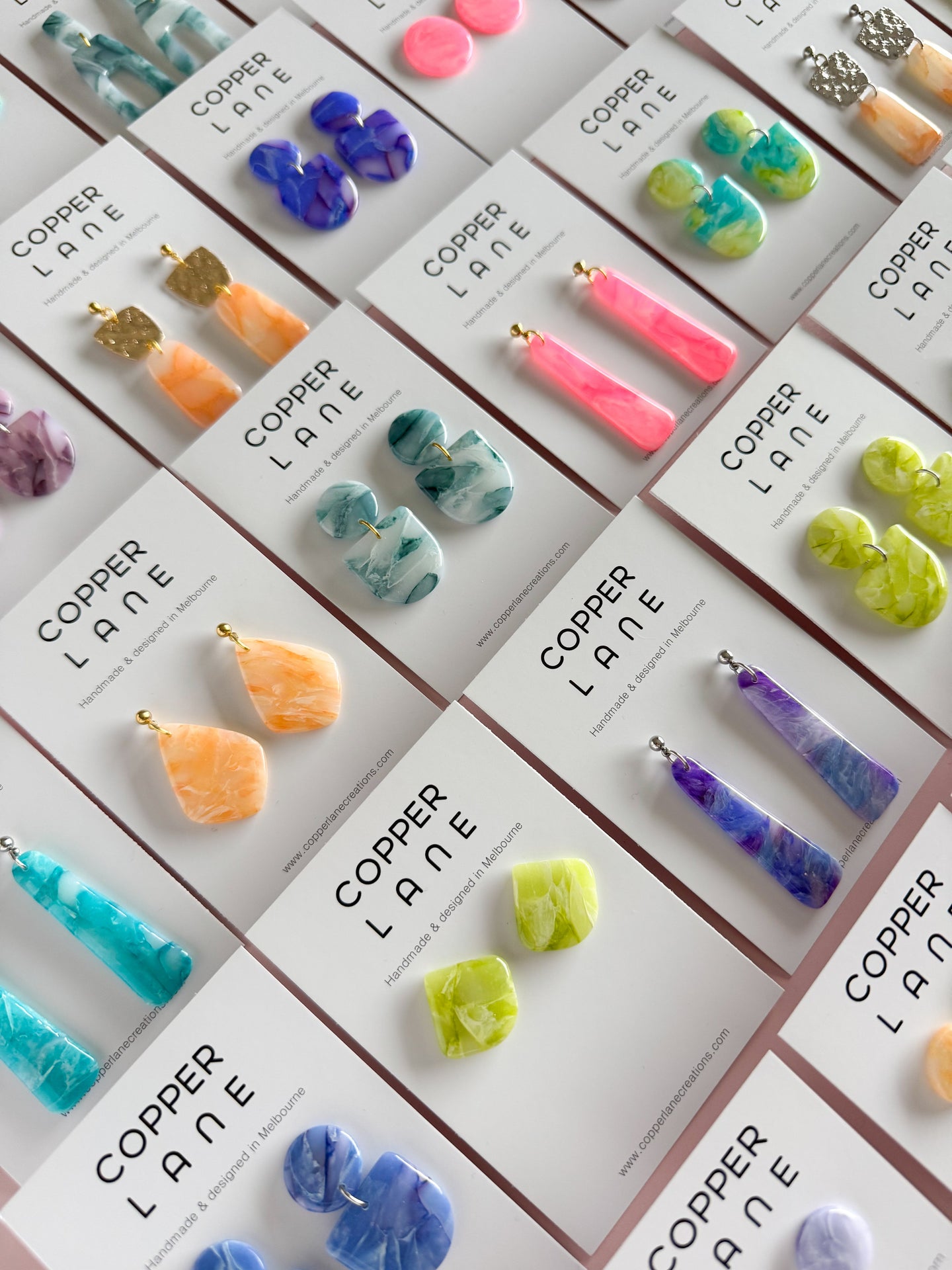 One of a kind handmade polymer clay earrings with hypoallergenic posts. Copper Lane Creations